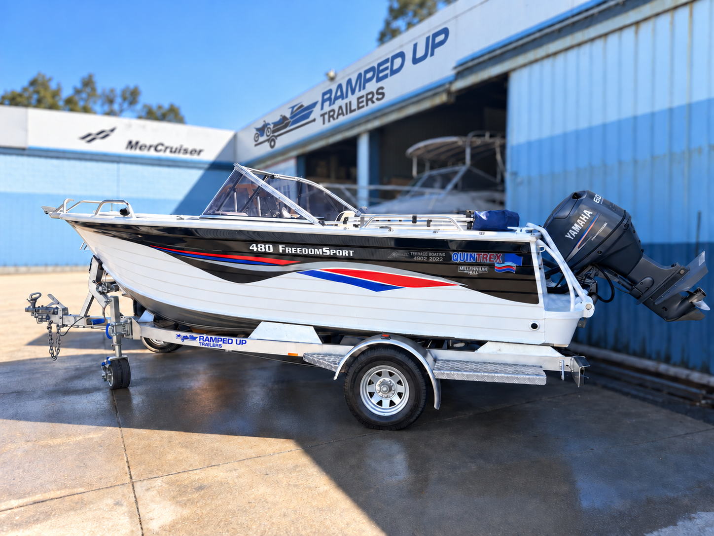 Boat launching from trailer at ramp